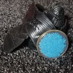 Woven belt with turquoise belt buckle