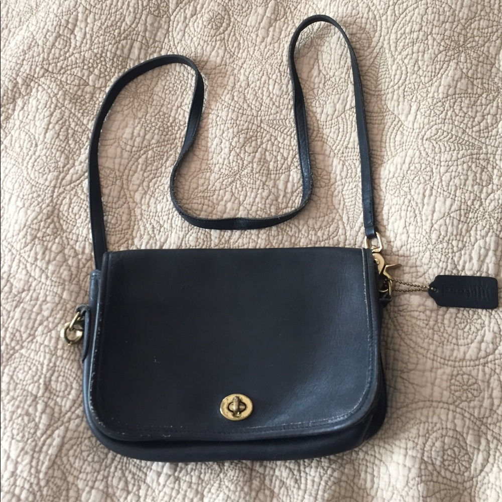Vintage Coach cross body purse.