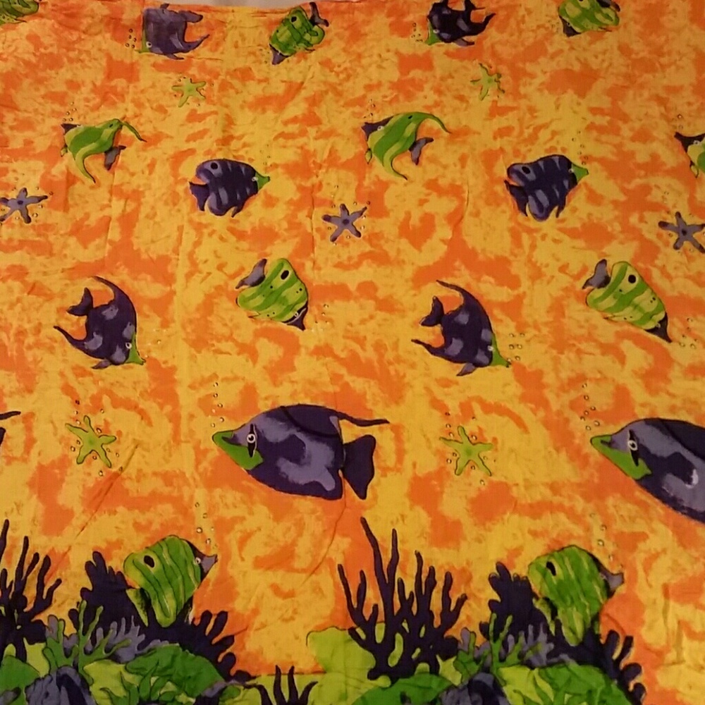 Yellow, orange, blue, green fish sarong