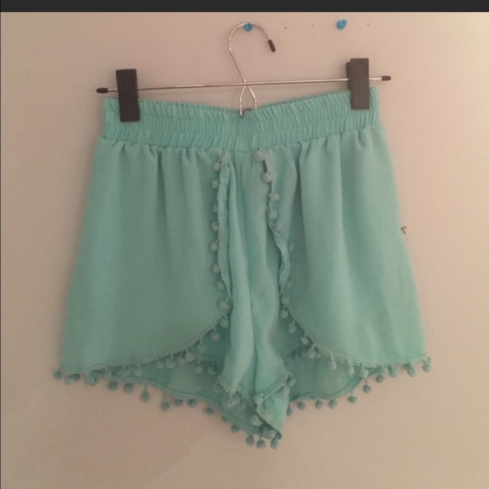 Blue Pom Pom shorts.
