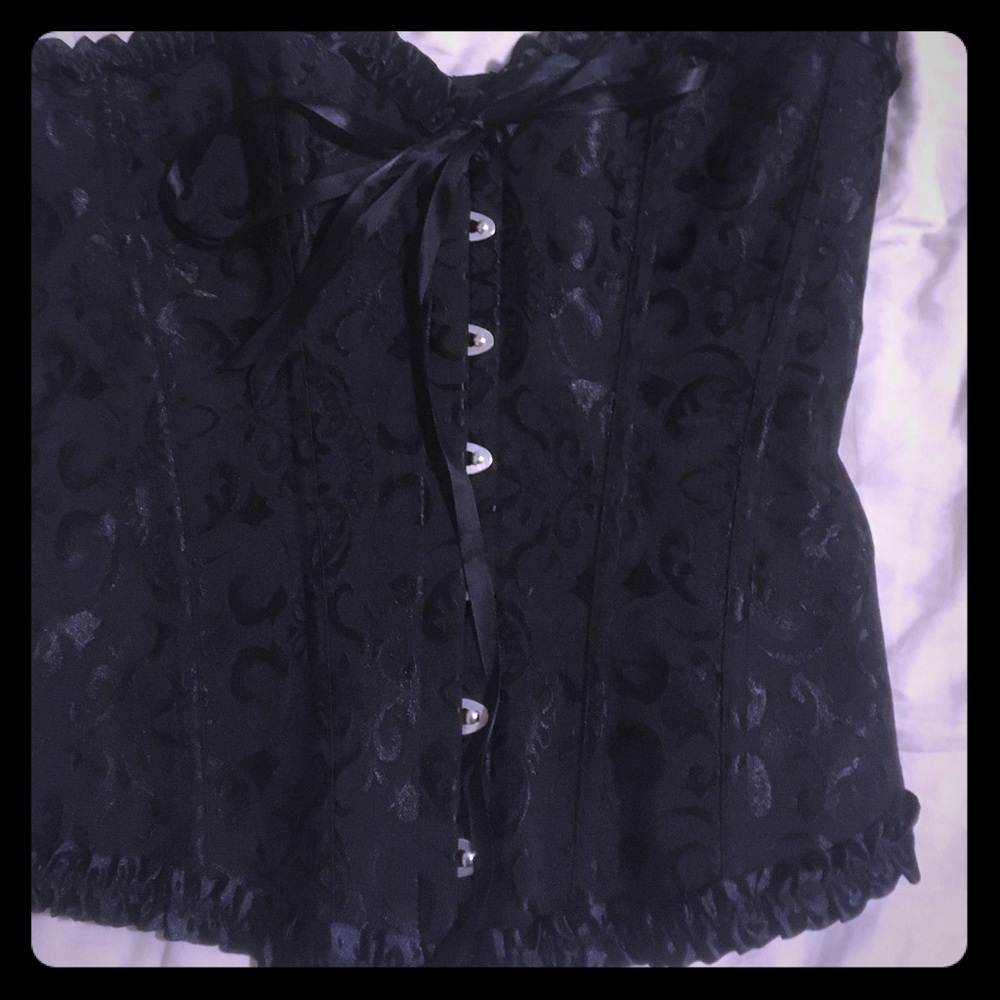 Large corset! Fits like a small/medium though!