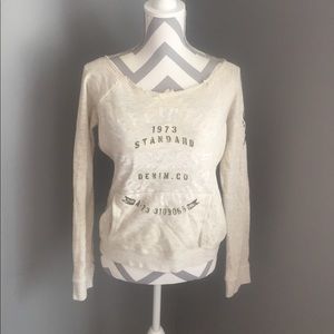 Small Affliction off the shoulder sweater.