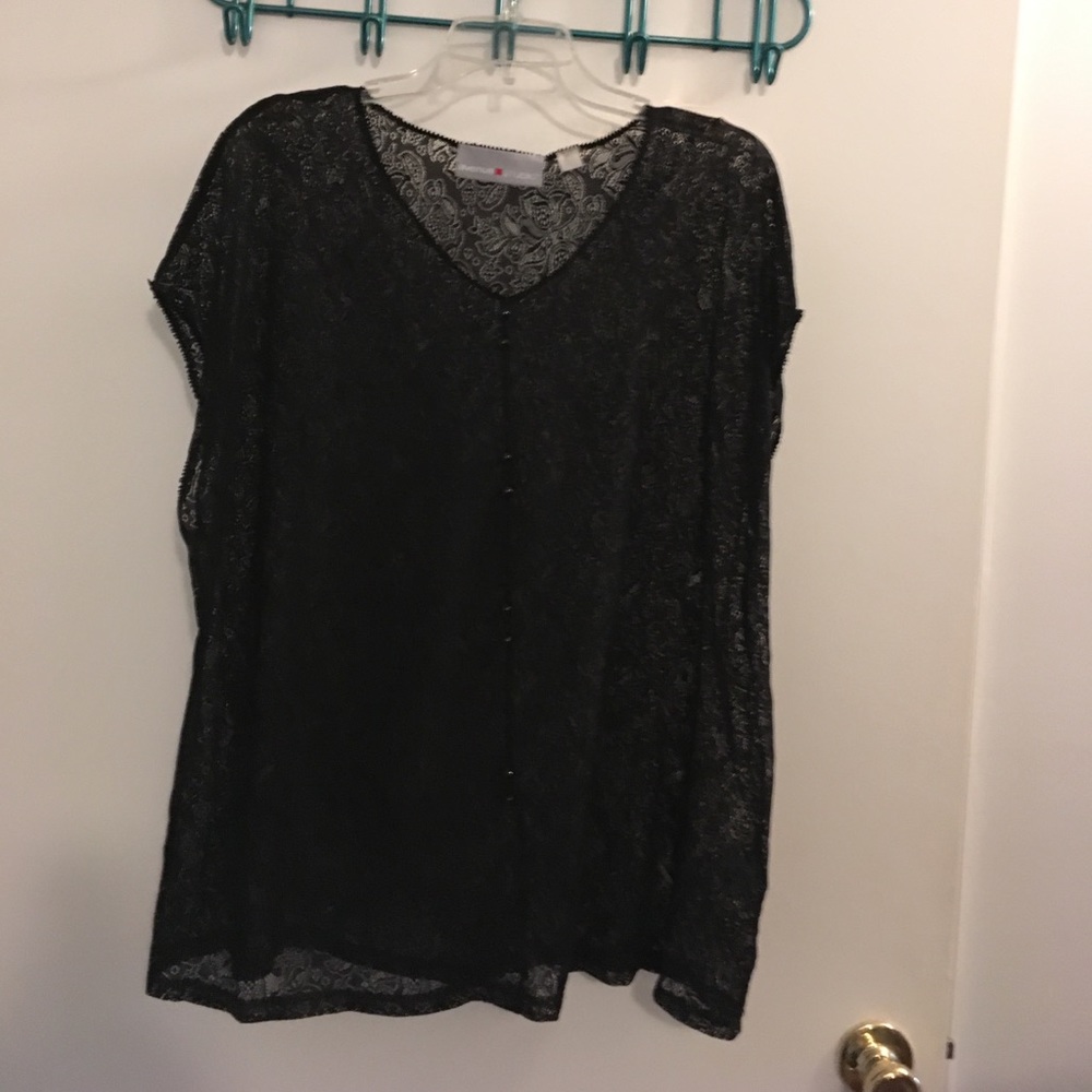 Avenue studio black top with design  throughout.