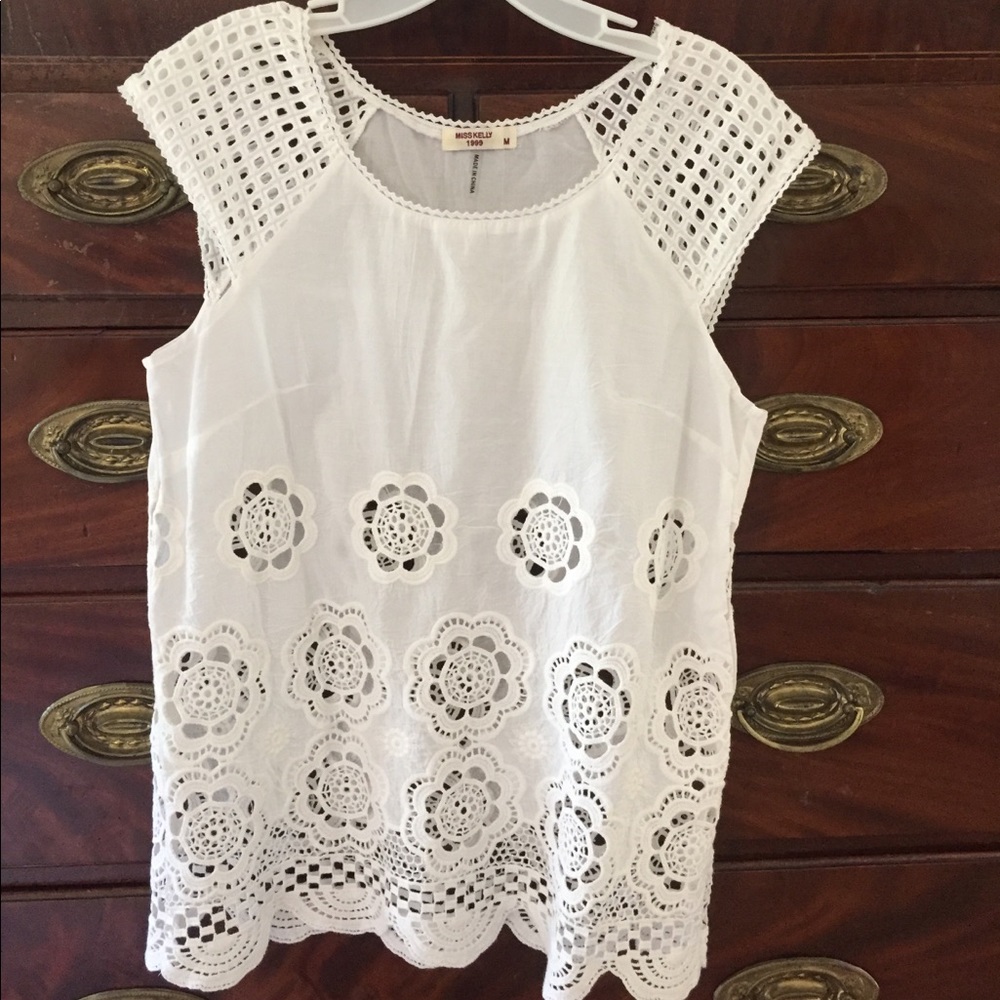 White top with crocheted medallion pattern