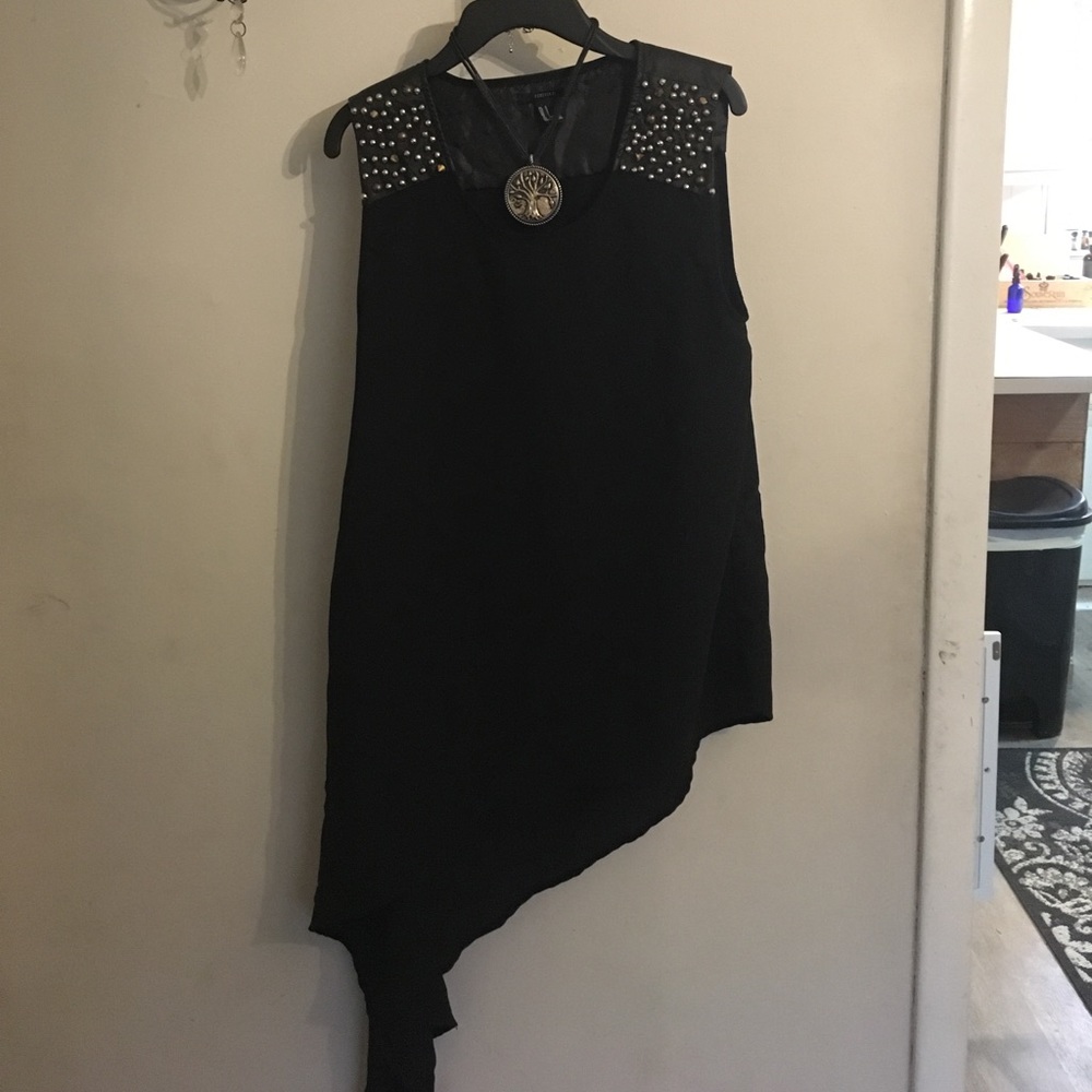 Black asymmetric tank top with studded shoulders