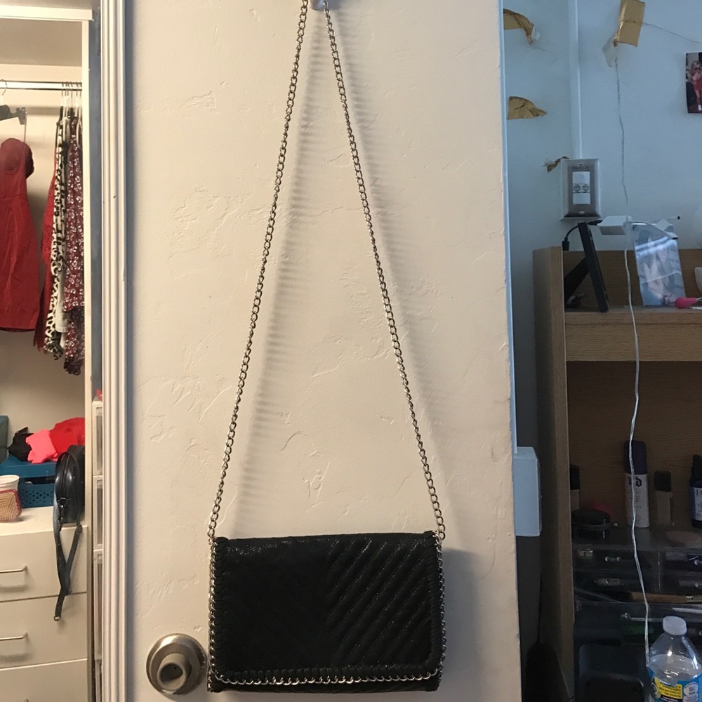 Black chain cross body.
