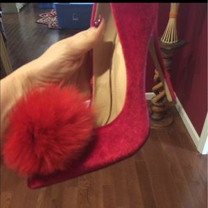 Red suede Pom Pom stilettos
