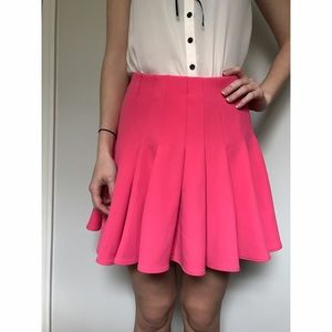 Pink pleated mini skirt