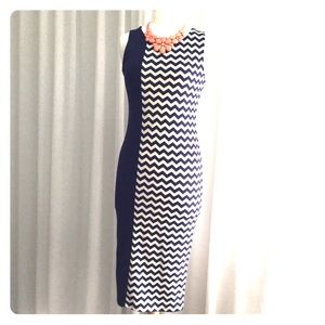 Form fitting navy/off white sleeveless dress