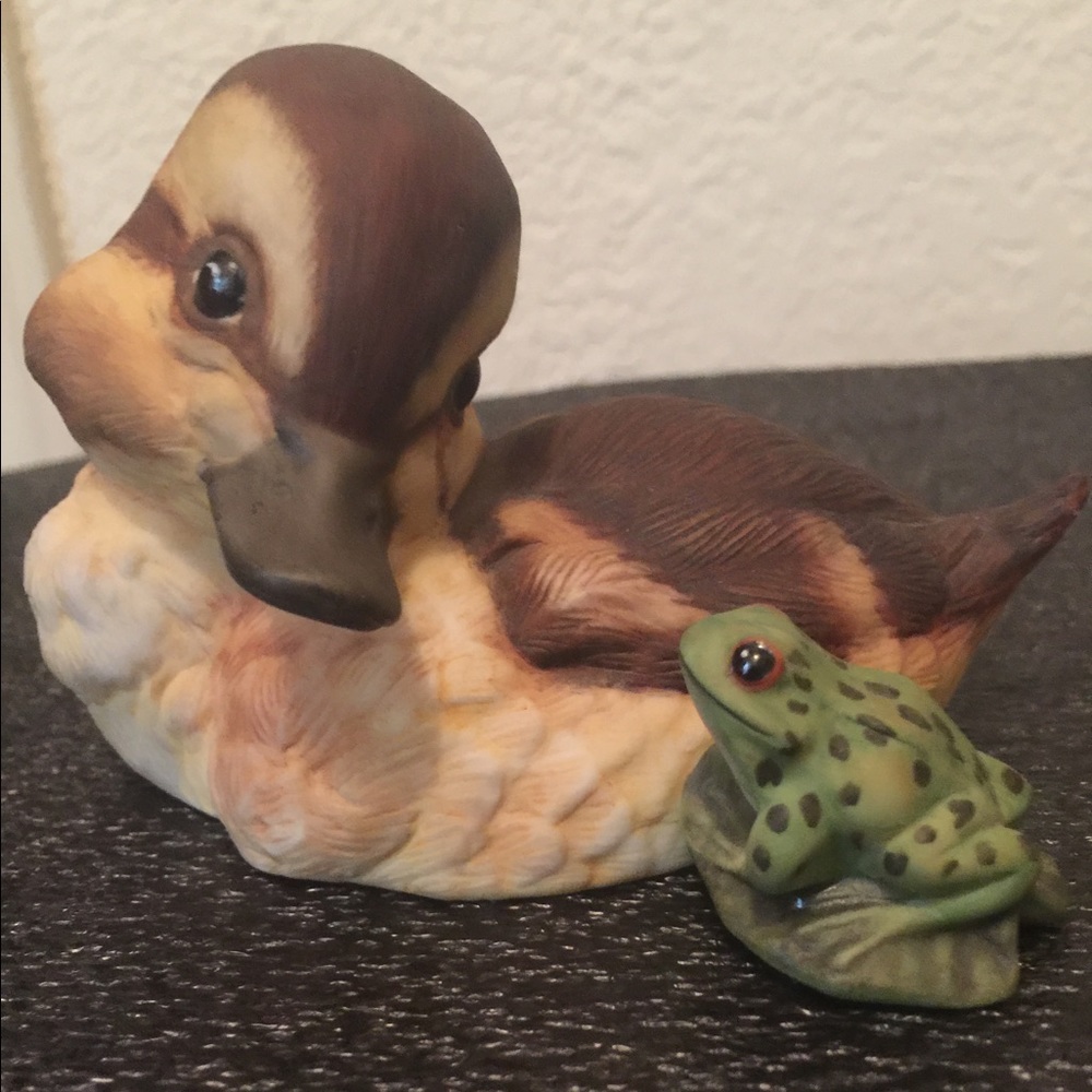 Ceramic duckling and frog statue
