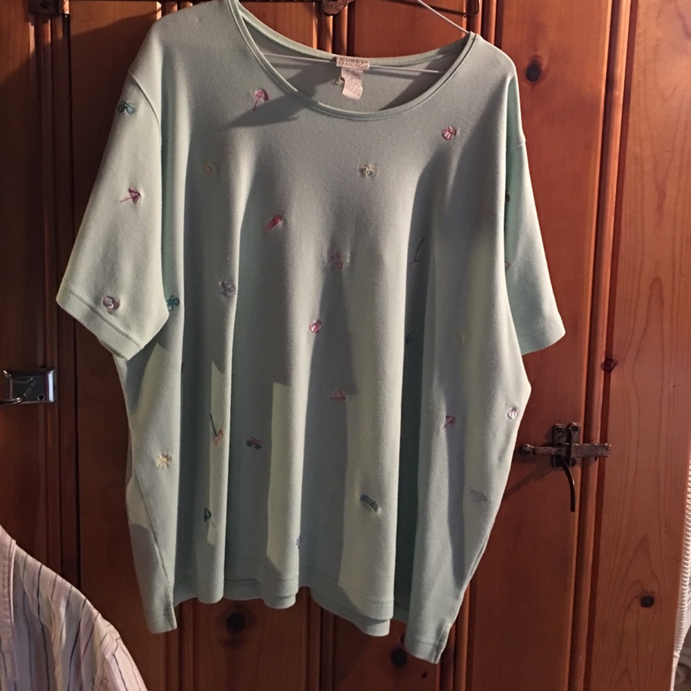Light green top w/ embroidered embellishments