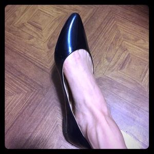 Metallic navy flat with gold heel detail