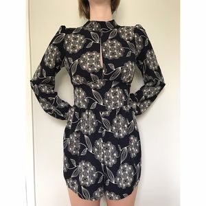 Floral mock neck romper with keyhole chest