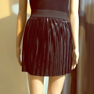 Shiny black mini skirt