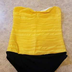 Bright yellow strapless body suit
