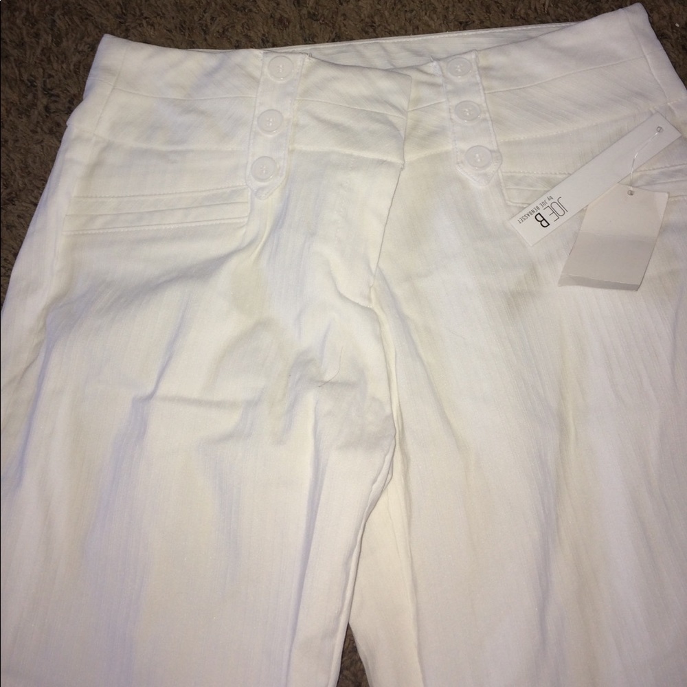 new white pants with tags