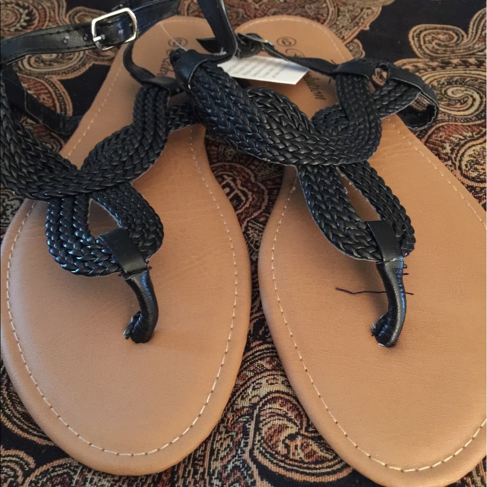 New in box ...Gladiator Flat Sandal ...size 9