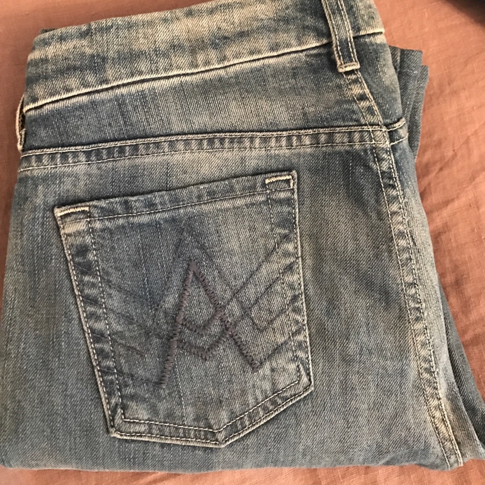 7 brand light wash boot cut jeans.