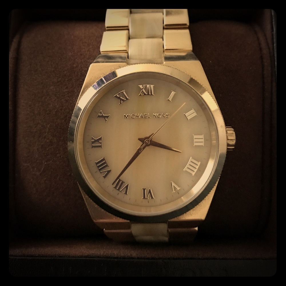 Gold Michael Kors watch. New, never worn.