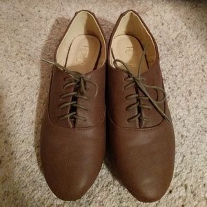 Brown lace-up flats