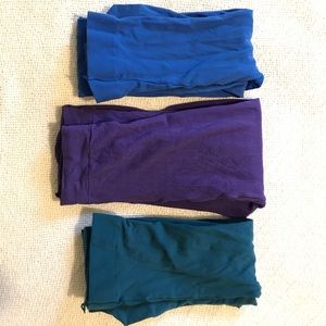 Blue, purple and dark teal colored tights