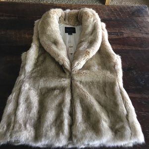 Anthropology faux fur beige tailored vest.