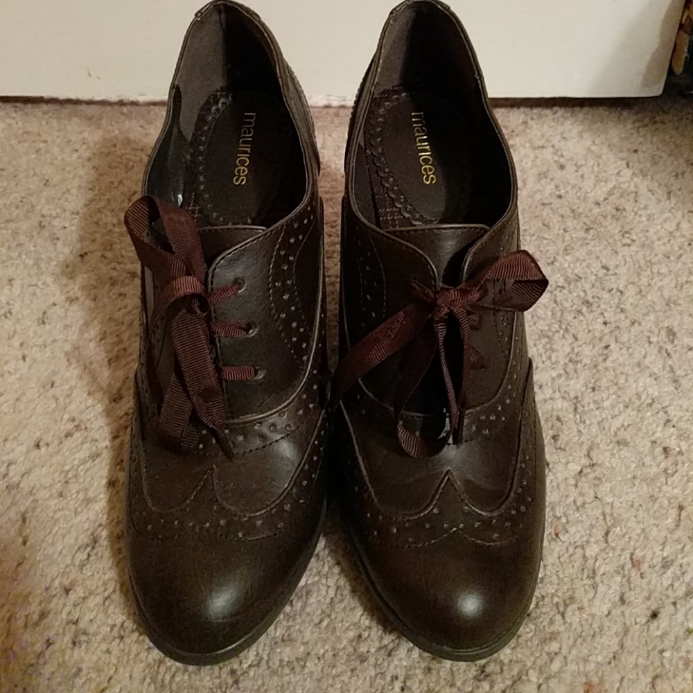 Brown brogued heels