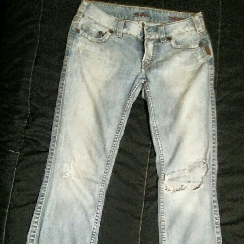 Silver light wash distressed jeans