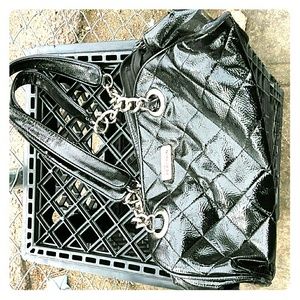 To Kenneth Cole purses