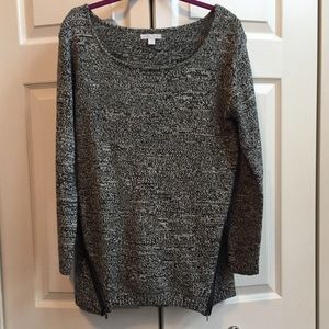 Black and white sweater with zipper details