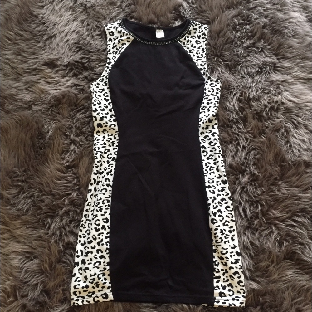 Mini Black Dress with animal print.