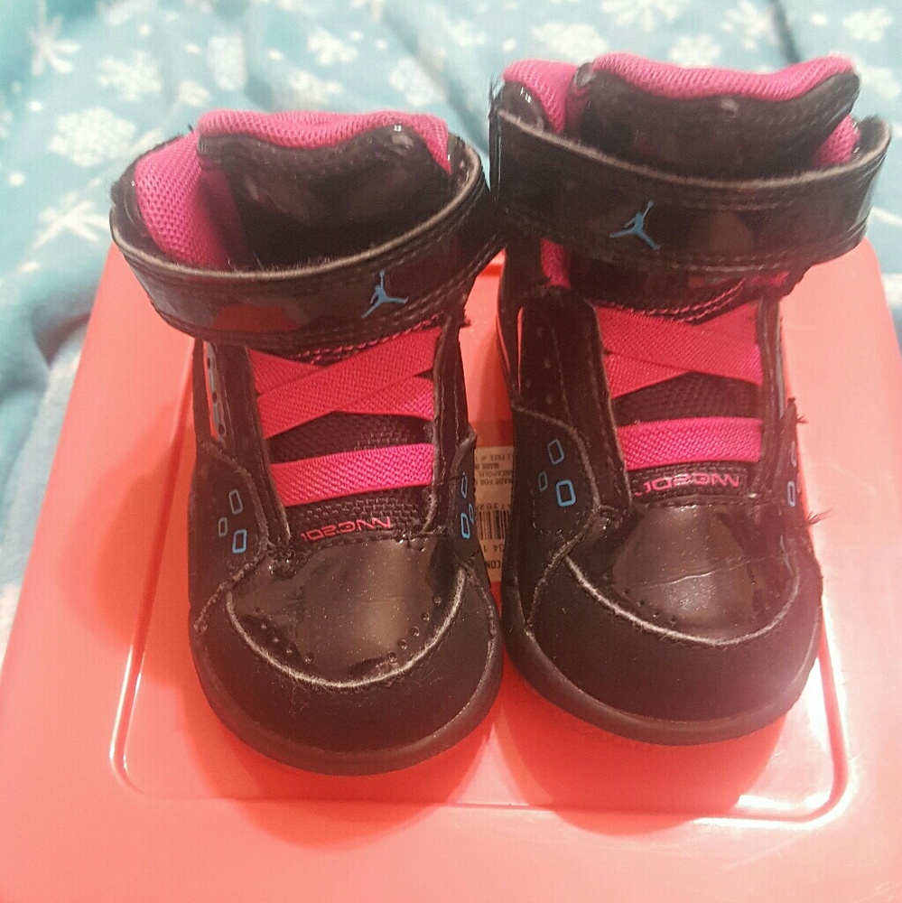 Super cute pink and black Jordans!!