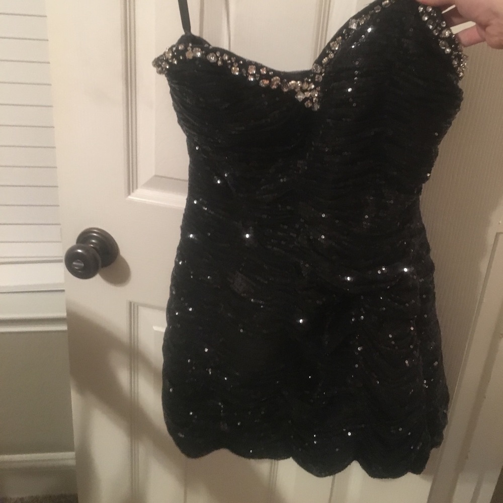 Form fitting formal black sequin dress