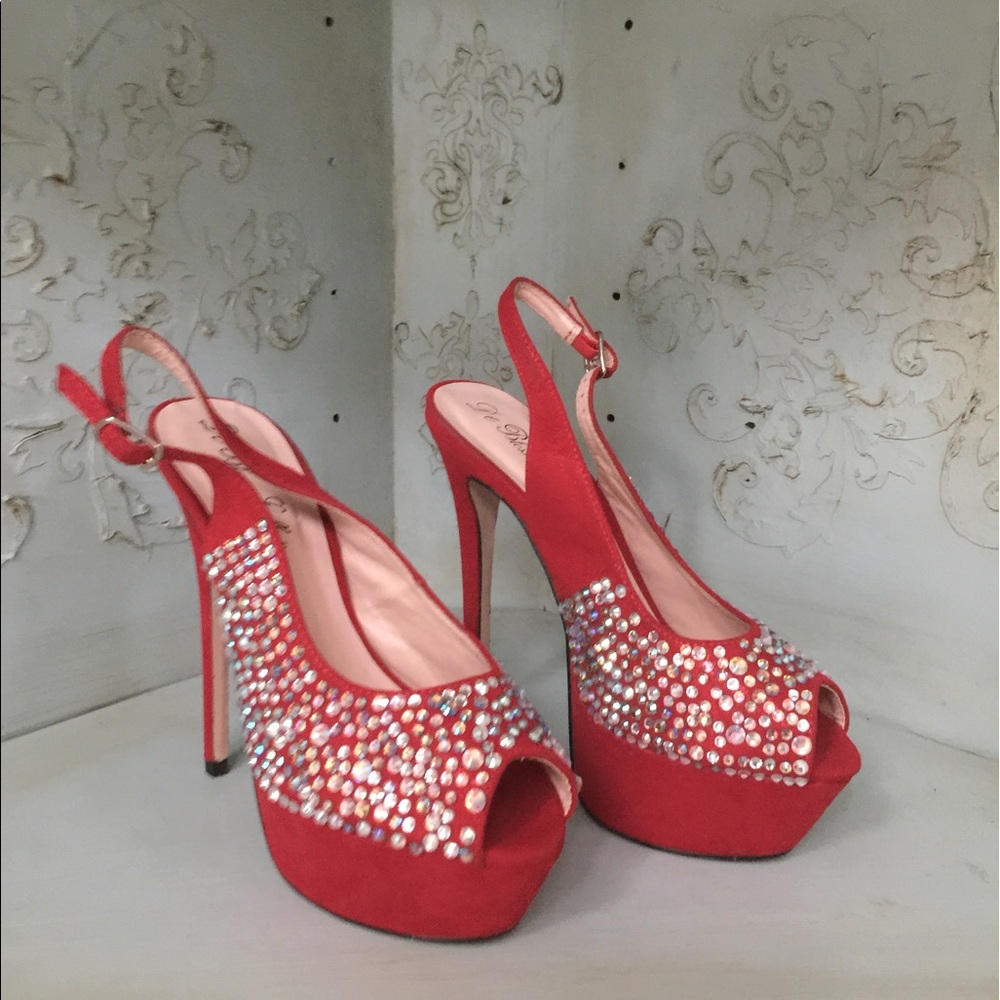 Red rhinestone straps heels.