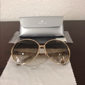 Swerovski  woman sunglasses new never used