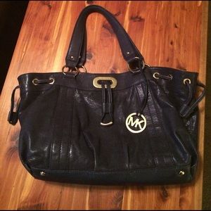 Michael Kors Navy and Gold purse