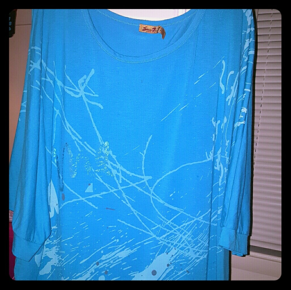 Baby blue 3 quarter sleeve shirt.