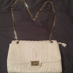 White and gold stitched purse