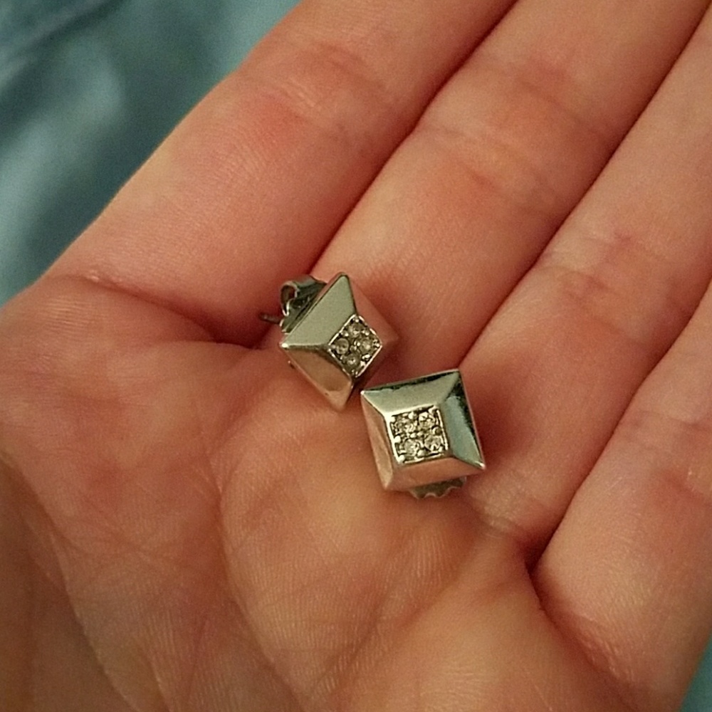 Silver stud earrings by Lia Sophia