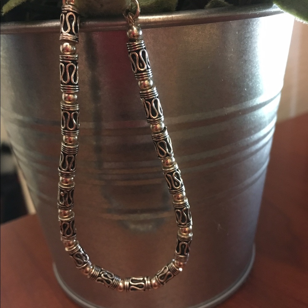 Silver bracelet/anklet with intricate beads
