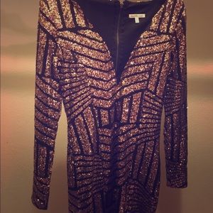 A Black & Gold sequins dress