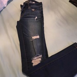 Blue distressed skinny jeans