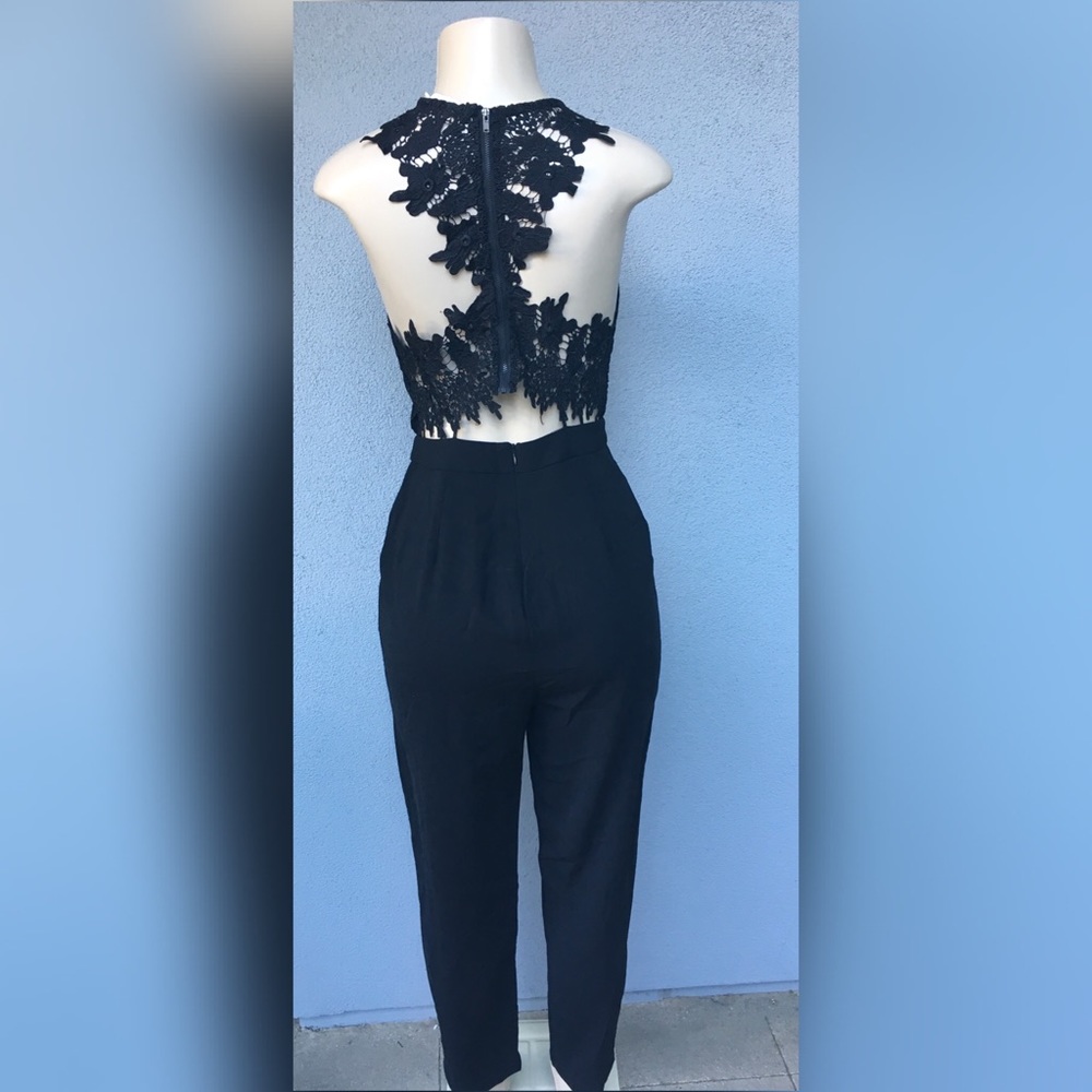 Black jumpsuit with zipper and pockets