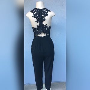 Black jumpsuit with zipper and pockets