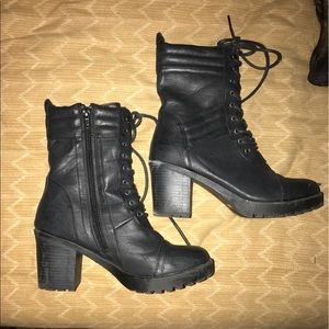 Black heeled combat boots