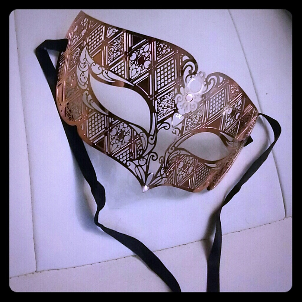 Copper colored metal mask
