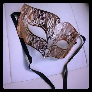 Copper colored metal mask