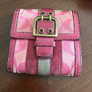 Pink Coach wallet.