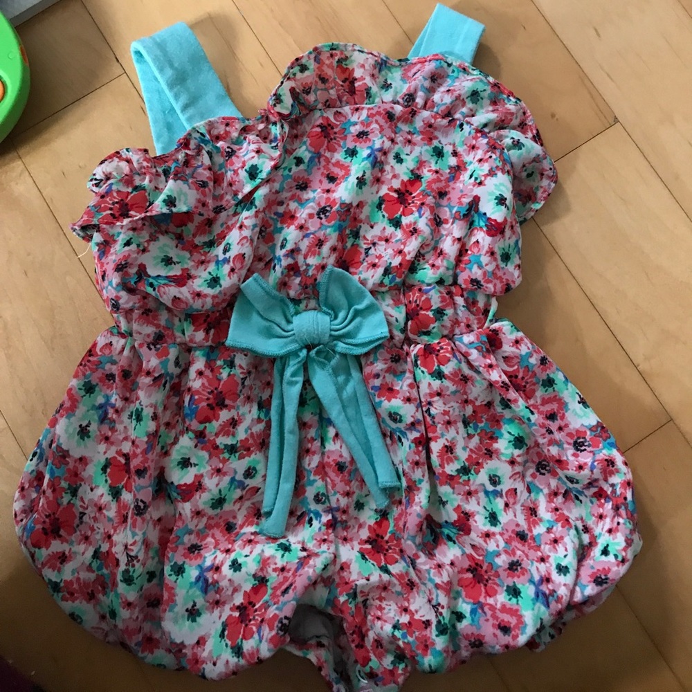 A toddler girl's Romper size 12M