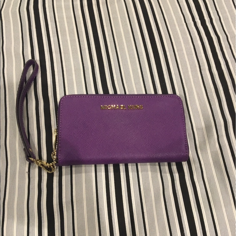 MK purple wristlet combo wallet iPhone case.